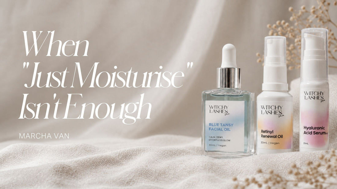 Three Witchy Lashes Skin products — Blue Tansy Facial Oil, Retinyl Renewal Oil and Hyaluronic Acid Serum — arranged on beige linen with dried flowers